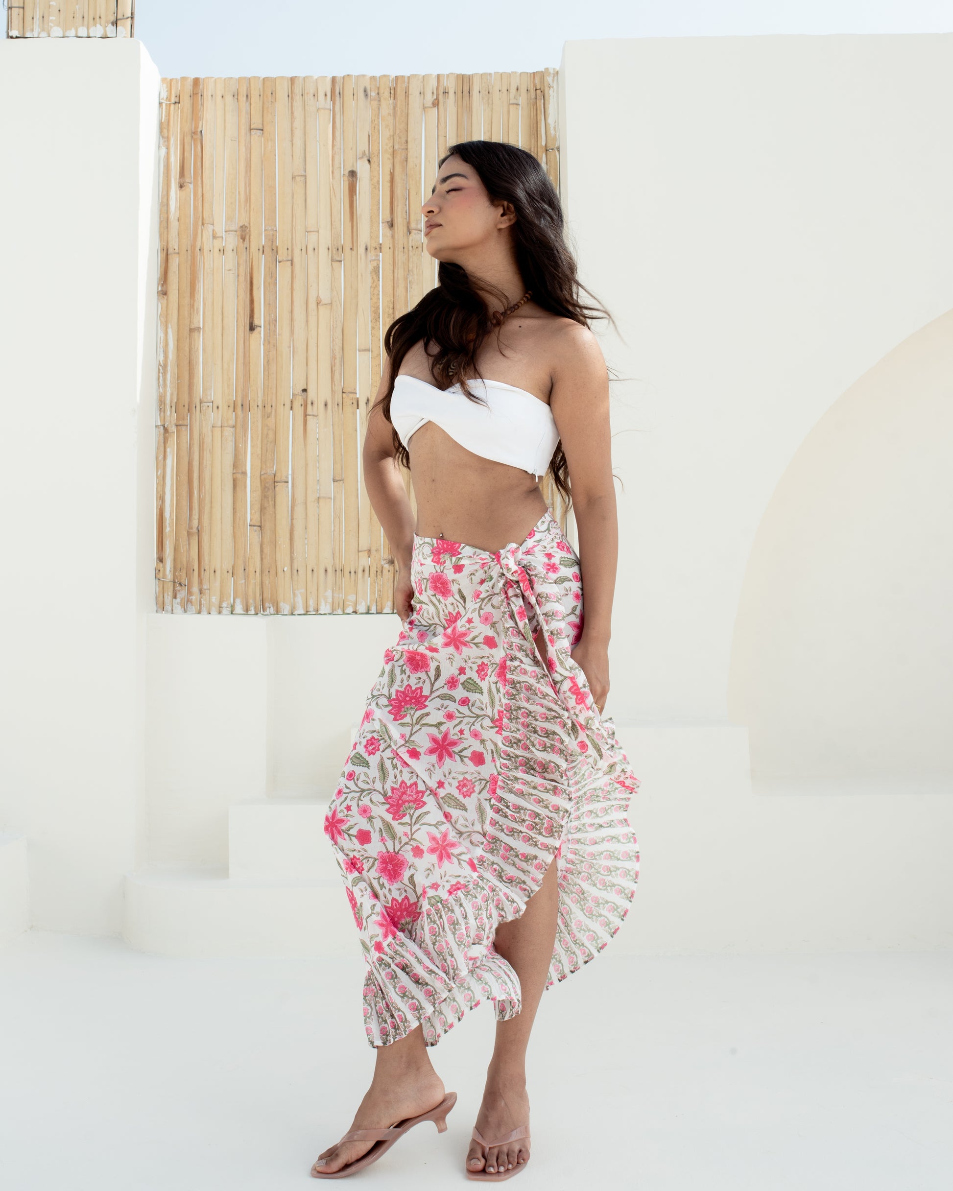Model wearing the Anar Bagh pink floral hand block printed cotton beach cover up