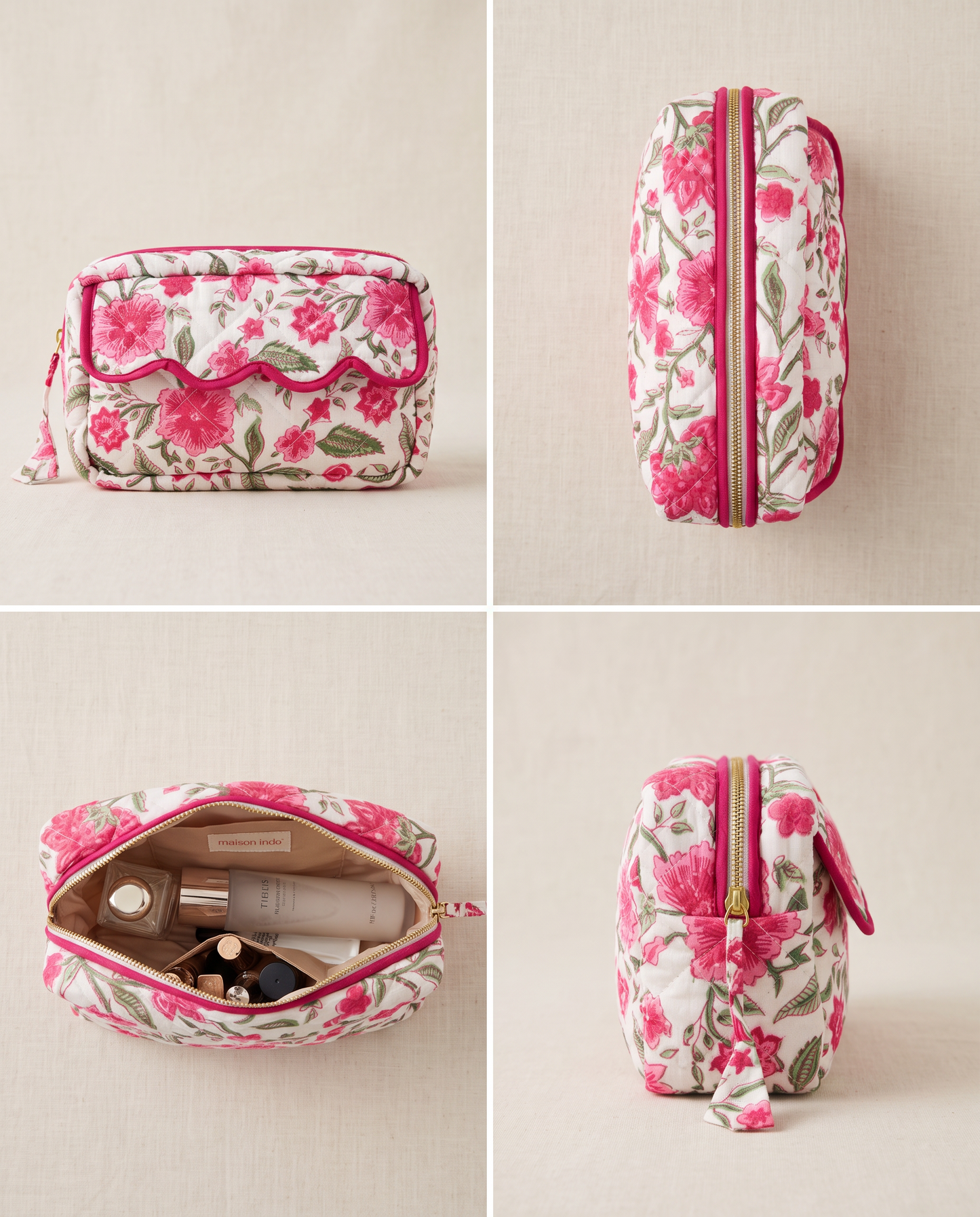 A floral makeup bag shown in four views on a light beige textured background: front, side, open with cosmetics inside, and back. The bag has a white base with pink and red flowers and green leaves, with pink trim and a pink zipper.