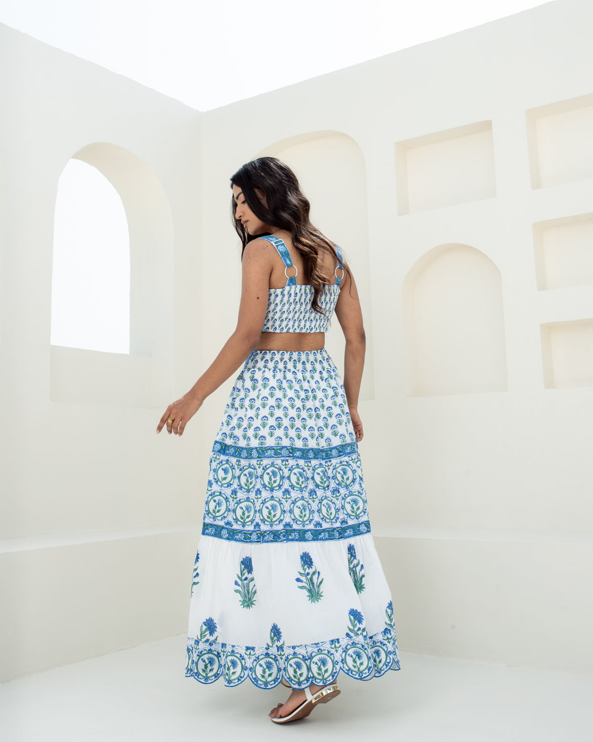 Model wearing the Blue Riviera hand block printed cotton maxi skirt back