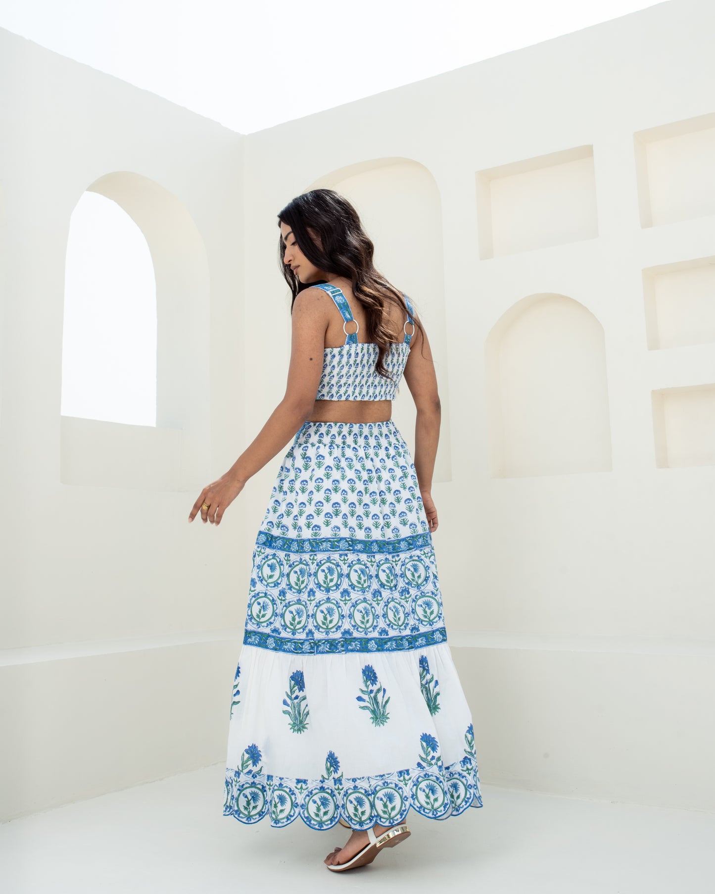 Model wearing the Blue Riviera hand block printed cotton midi skirt back